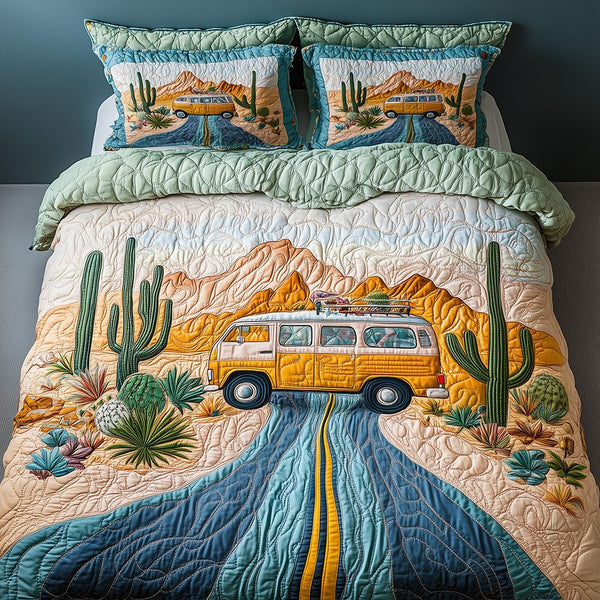 Desert Highway quilted 3-piece bedding set on a made bed with two matching pillow shams