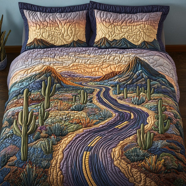 Desert Highway quilted 3-piece bedding set on a made bed with two matching pillow shams