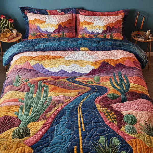 Desert Highway quilted 3-piece bedding set on a made bed with two matching pillow shams