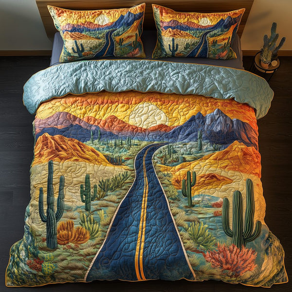 Desert Highway quilted 3-piece bedding set on a made bed with two matching pillow shams