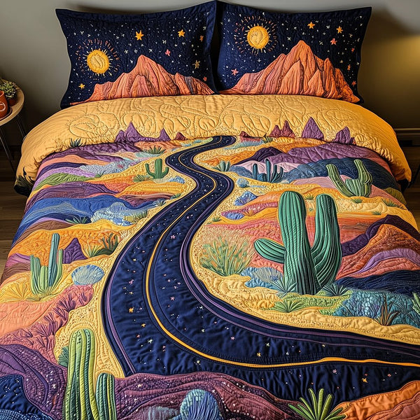 Desert Highway quilted 3-piece bedding set on a made bed with two matching pillow shams