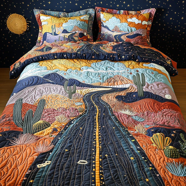Desert Highway quilted 3-piece bedding set on a made bed with two matching pillow shams