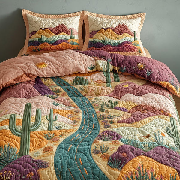 Desert Highway quilted 3-piece bedding set on a made bed with two matching pillow shams