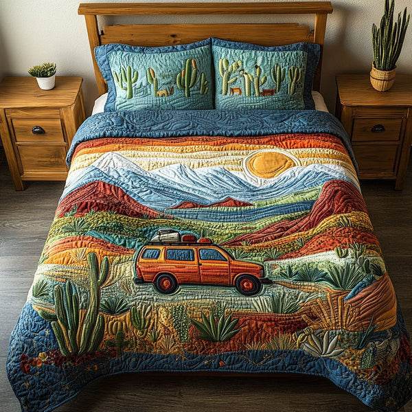 Desert Horizon quilted 3-piece bedding set on a made bed with two matching pillow shams