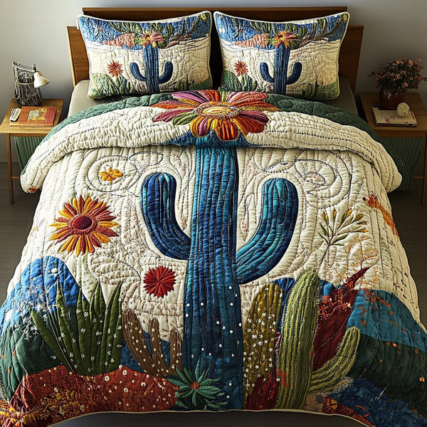 Desert Jewel quilted 3-piece bedding set on a made bed with two matching pillow shams