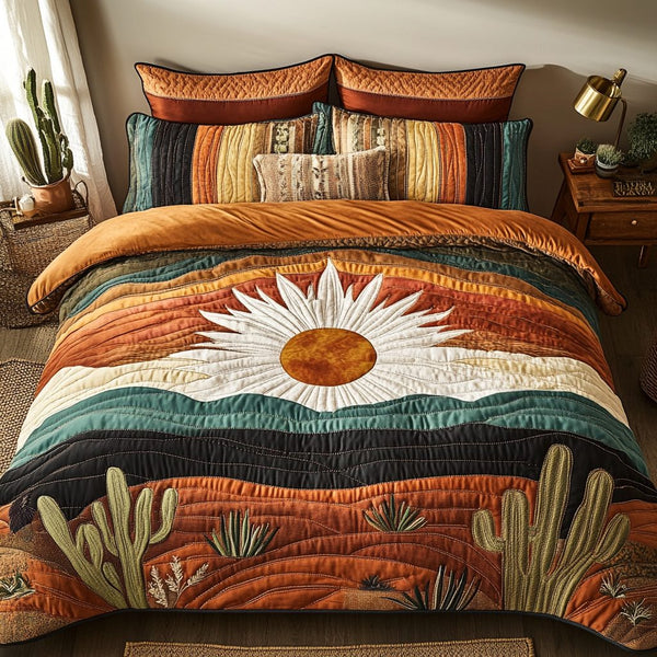 Desert Mirage quilted 3-piece bedding set on a made bed with two matching pillow shams