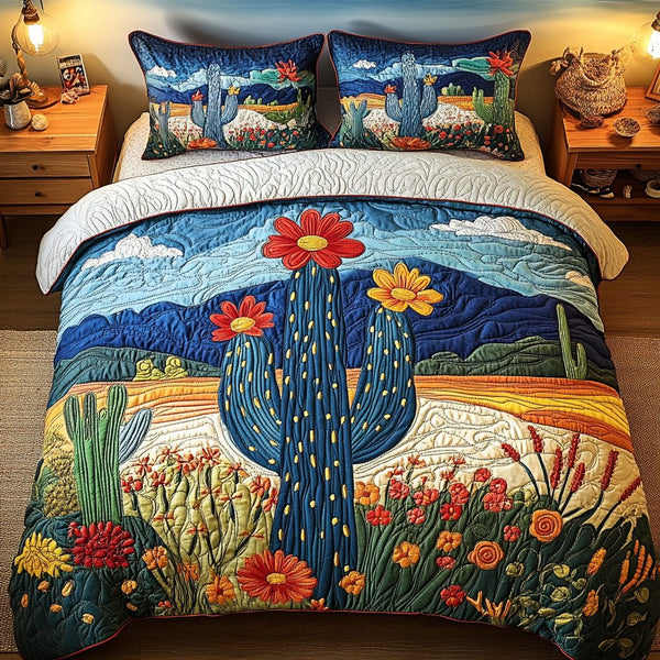 Desert Oasis quilted 3-piece bedding set on a made bed with two matching pillow shams