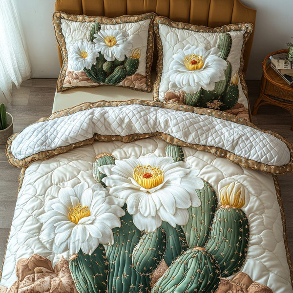 Desert Rose quilted 3-piece bedding set on a made bed with two matching pillow shams