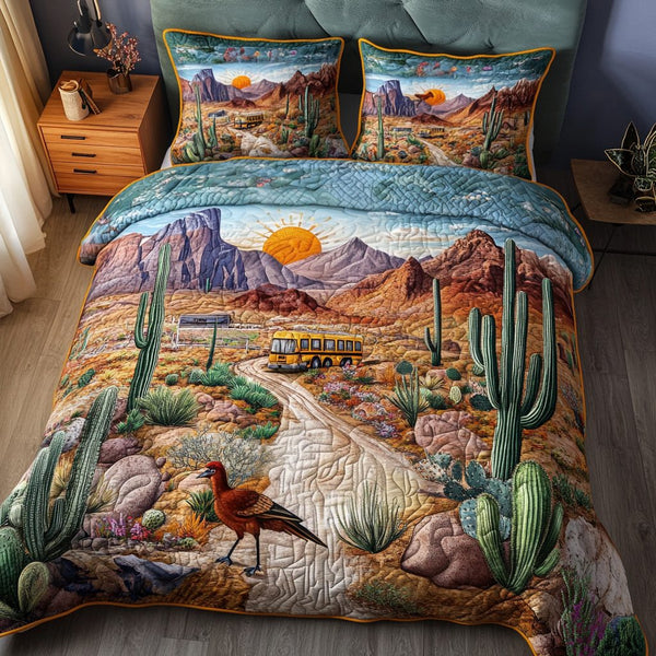 Desert Serenity quilted 3-piece bedding set on a made bed with two matching pillow shams