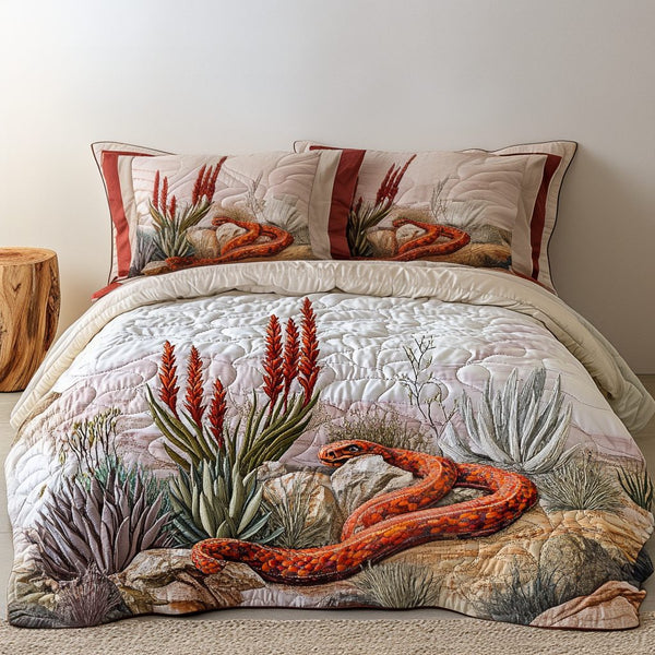 Desert Serpent quilted 3-piece bedding set on a made bed with two matching pillow shams