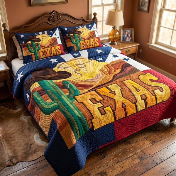 Desert Sunset quilted 3-piece bedding set on a made bed with two matching pillow shams