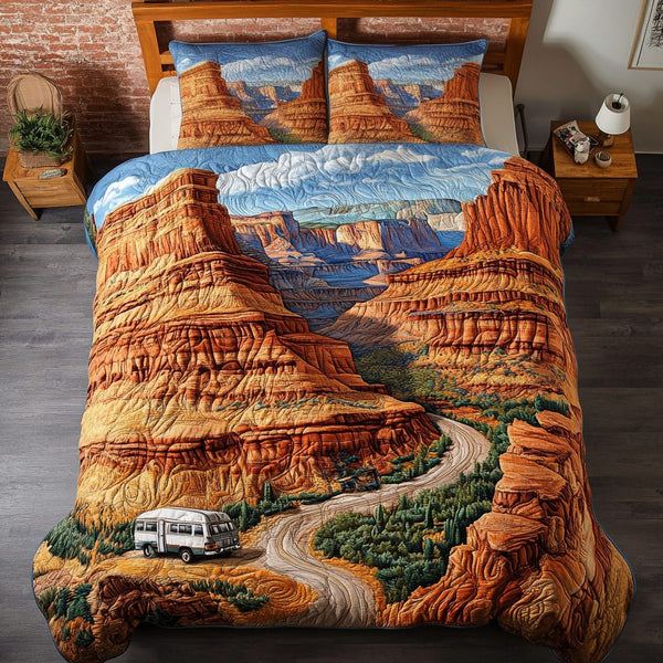 Desert Trail quilted 3-piece bedding set on a made bed with two matching pillow shams
