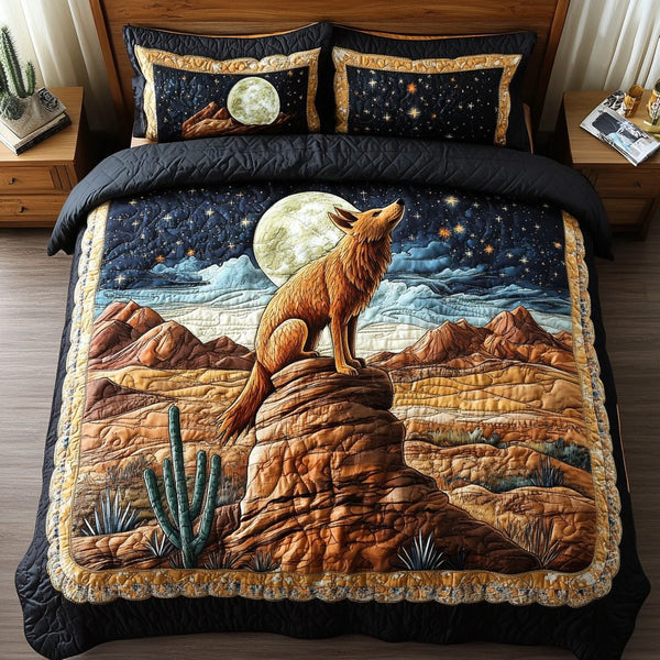Desert Wanderer quilted 3-piece bedding set on a made bed with two matching pillow shams
