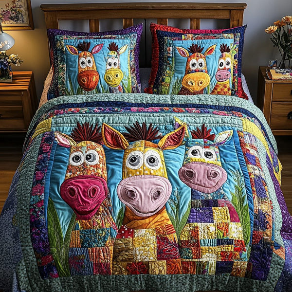 Donkey Delight quilted 3-piece bedding set on a made bed with two matching pillow shams