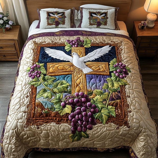 Dove Vine Cross quilted 3-piece bedding set on a made bed in a softly lit bedroom