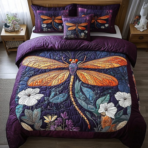 Dragon Glow quilted 3-piece bedding set on a made bed with two matching pillow shams