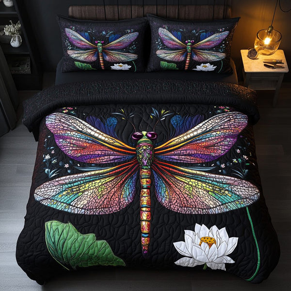 Dragonflight Dreams quilted 3-piece bedding set on a made bed with two matching pillow shams