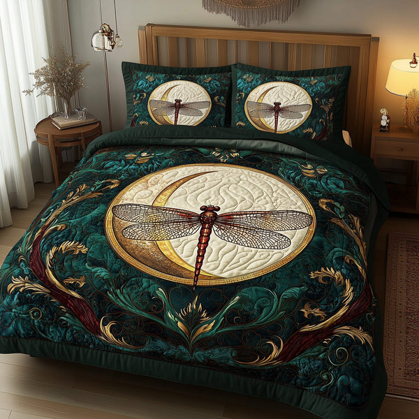 Dragonfly and Crescent Moon quilted 3-piece bedding set on a made bed with two matching pillow shams
