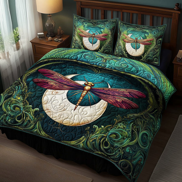 Dragonfly and Crescent Moon quilted 3-piece bedding set on a made bed with two matching pillow shams