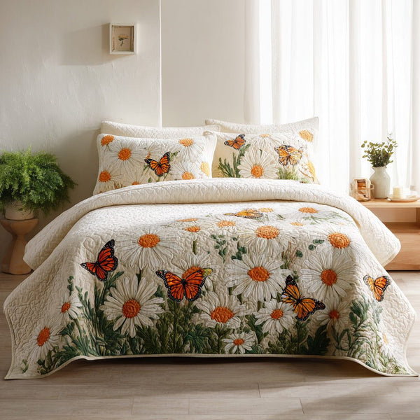 Dragonfly Daisies quilted 3-piece bedding set on a made bed with two matching pillow shams