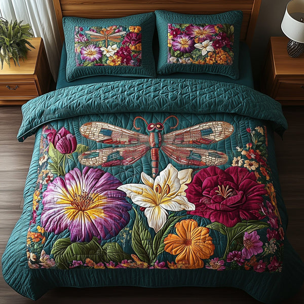 Dragonfly Dream quilted 3-piece bedding set on a made bed with two matching pillow shams
