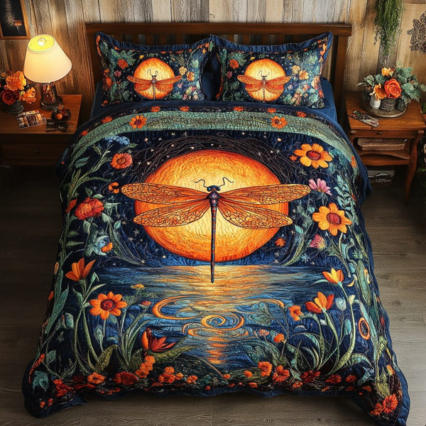 Dragonfly Dream quilted 3-piece bedding set on a made bed with two matching pillow shams