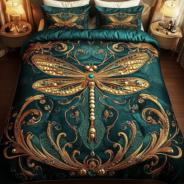 Dragonfly Dream quilted 3-piece bedding set on a made bed with two matching pillow shams