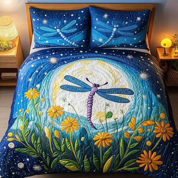 Dragonfly Dream quilted 3-piece bedding set on a made bed with two matching pillow shams