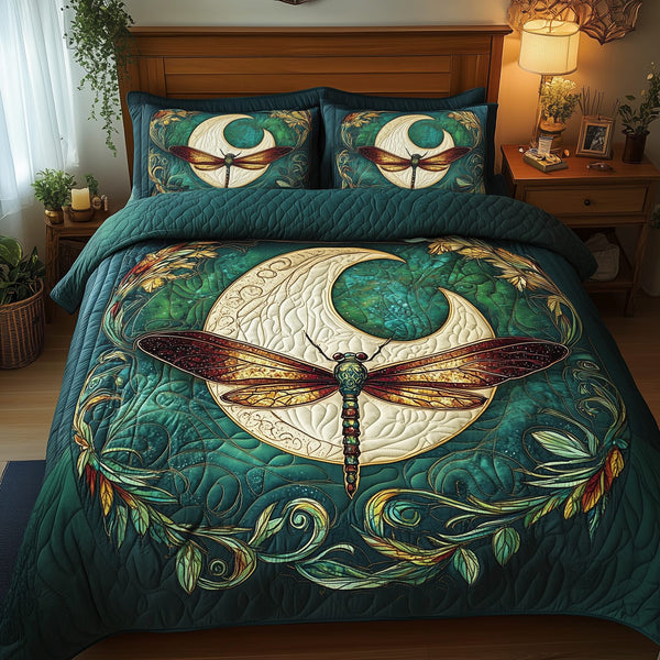 Dragonfly Mandala quilted 3-piece bedding set on a made bed with two matching pillow shams
