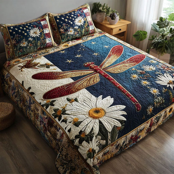 Dragonfly of Liberty quilted 3-piece bedding set on a made bed in a warmly lit bedroom