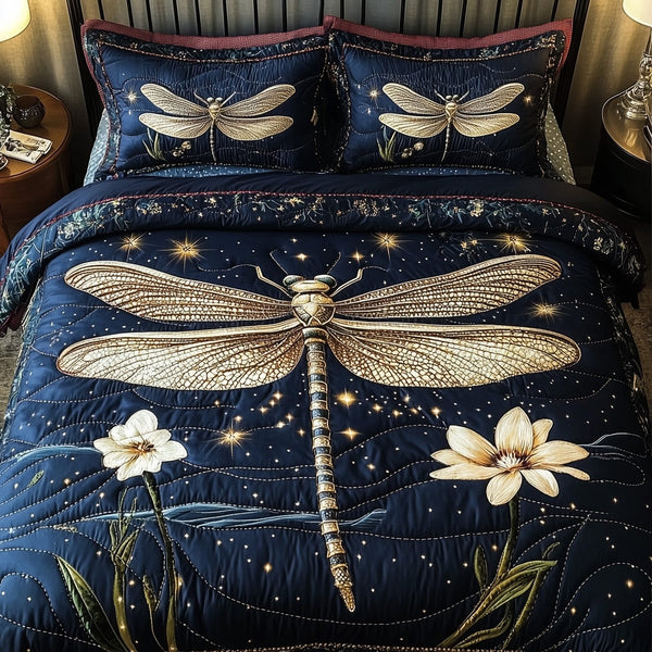 Dragonfly Whisper quilted 3-piece bedding set on a made bed with two matching pillow shams