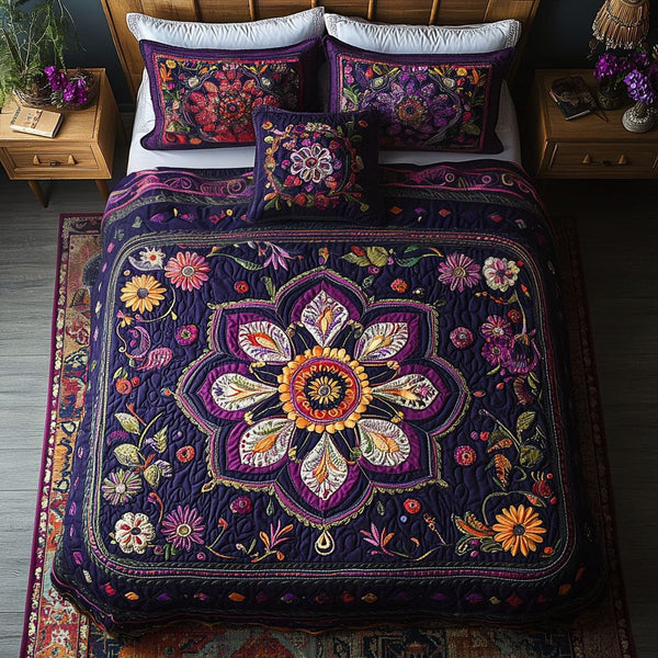 Dream Catcher quilted 3-piece bedding set on a made bed with two matching pillow shams