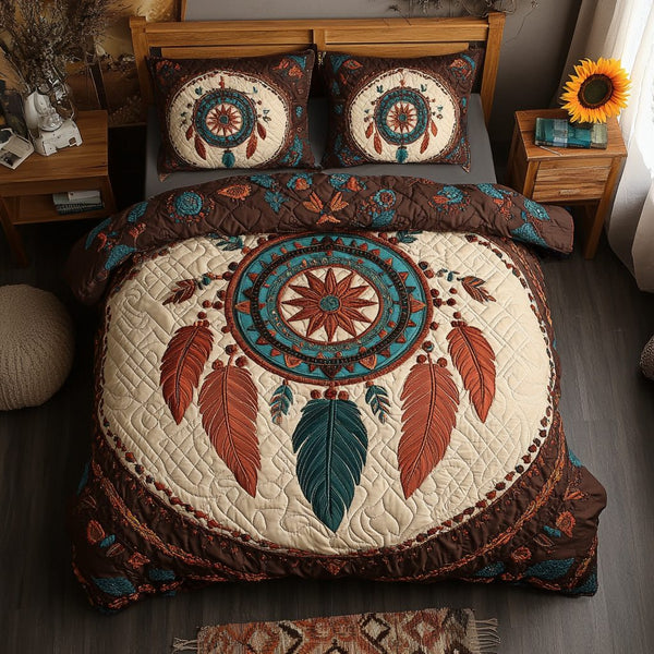 Dream Catcher quilted 3-piece bedding set on a made bed with two matching pillow shams