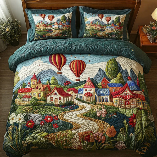 Dream Fields quilted 3-piece bedding set on a made bed with two matching pillow shams