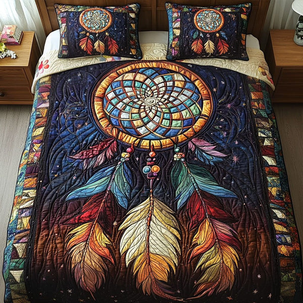 Dream Haven quilted 3-piece bedding set on a made bed with two matching pillow shams