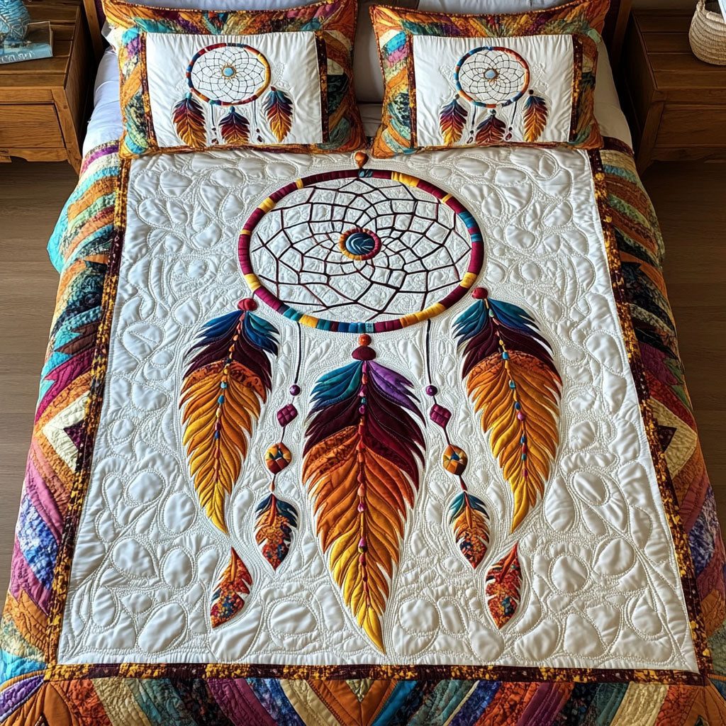 Dream Keeper quilted 3-piece bedding set on a made bed with two matching pillow shams