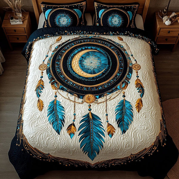 Dream Whisperer quilted 3-piece bedding set on a made bed with two matching pillow shams