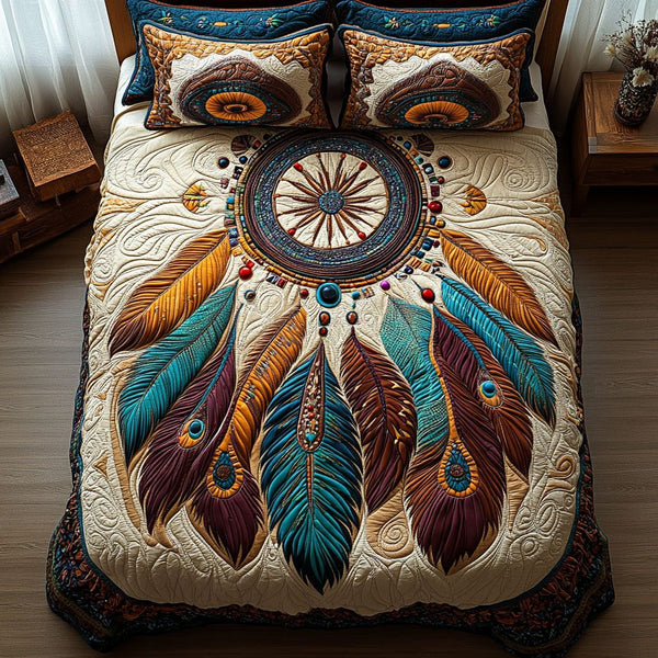 Dreamcatcher Bliss quilted 3-piece bedding set on a made bed with two matching pillow shams