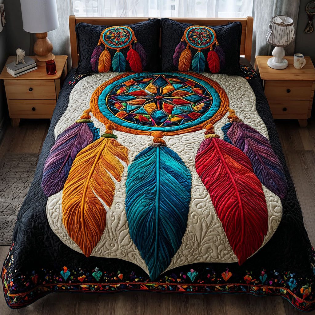 Dreamcatcher Bloom quilted 3-piece bedding set on a made bed with two matching pillow shams