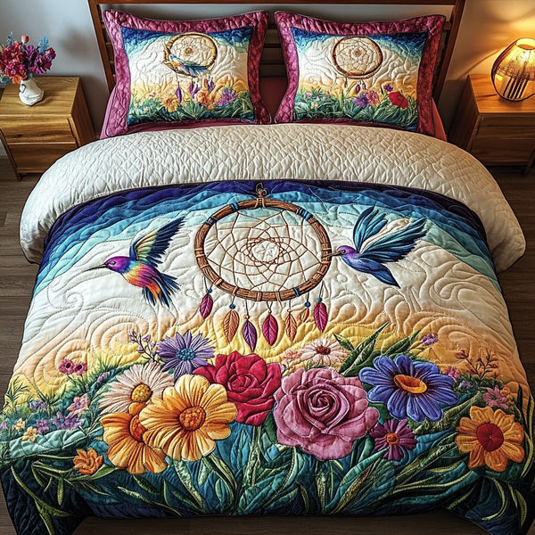 Dreamcatcher Meadow Glow quilted 3-piece bedding set on a made bed with two matching pillow shams
