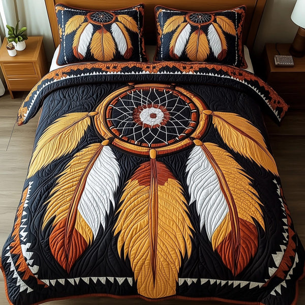 Dreamcatcher quilted 3-piece bedding set on a made bed with two matching pillow shams