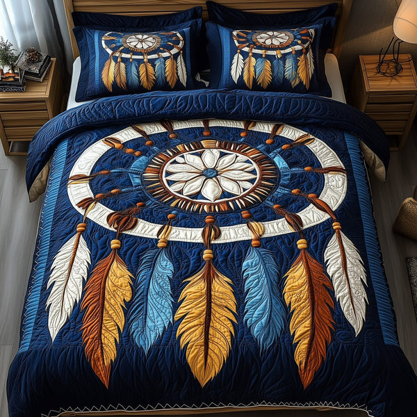 Dreamcatcher quilted 3-piece bedding set on a made bed with two matching pillow shams