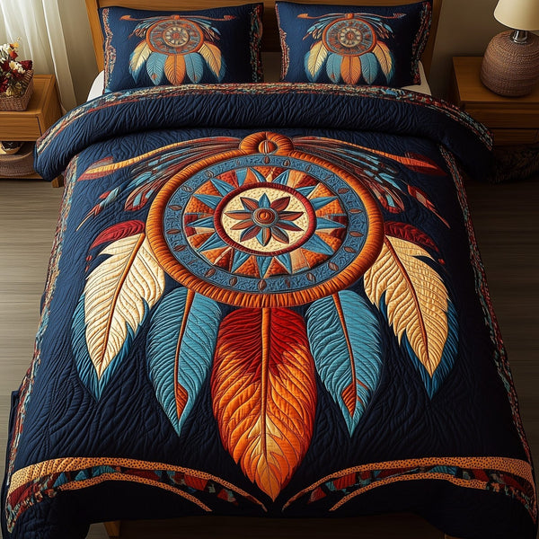 Dreamcatcher quilted 3-piece bedding set on a made bed with two matching pillow shams