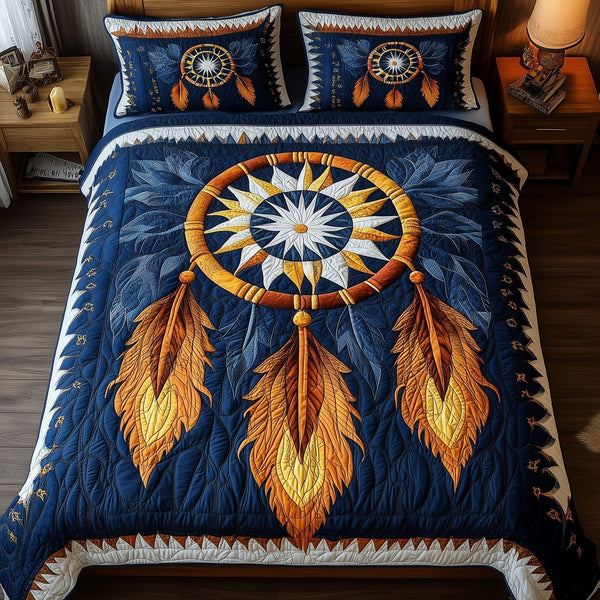 Dreamcatcher quilted 3-piece bedding set on a made bed with two matching pillow shams