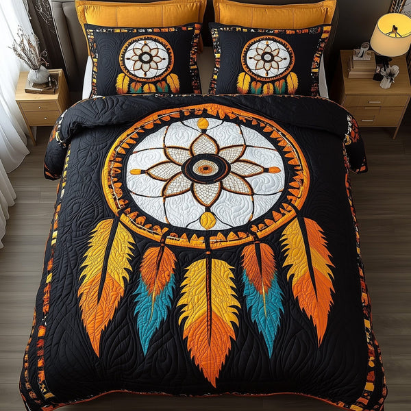 Dreamcatcher quilted 3-piece bedding set on a made bed with two matching pillow shams