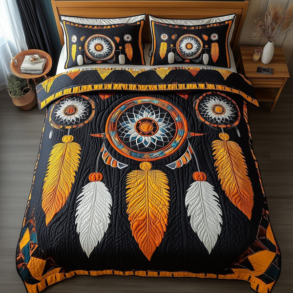 Dreamcatcher quilted 3-piece bedding set on a made bed with two matching pillow shams