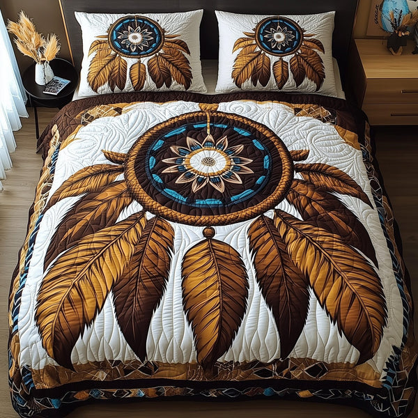 Dreamcatcher quilted 3-piece bedding set on a made bed with two matching pillow shams