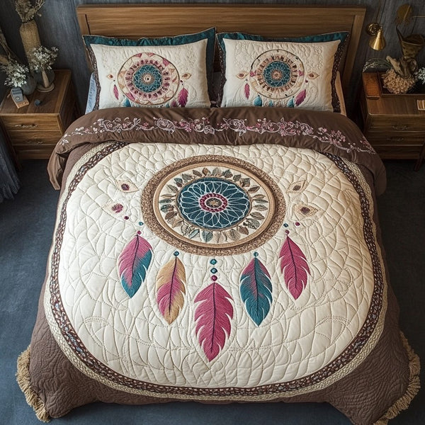 Dreamcatcher Serenity quilted 3-piece bedding set on a made bed with two matching pillow shams