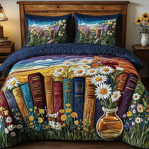 Dreaming in Pages quilted 3-piece bedding set on a made bed with two matching pillow shams