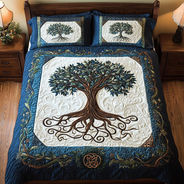 Dreamscape Grove quilted 3-piece bedding set on a made bed with two matching pillow shams
